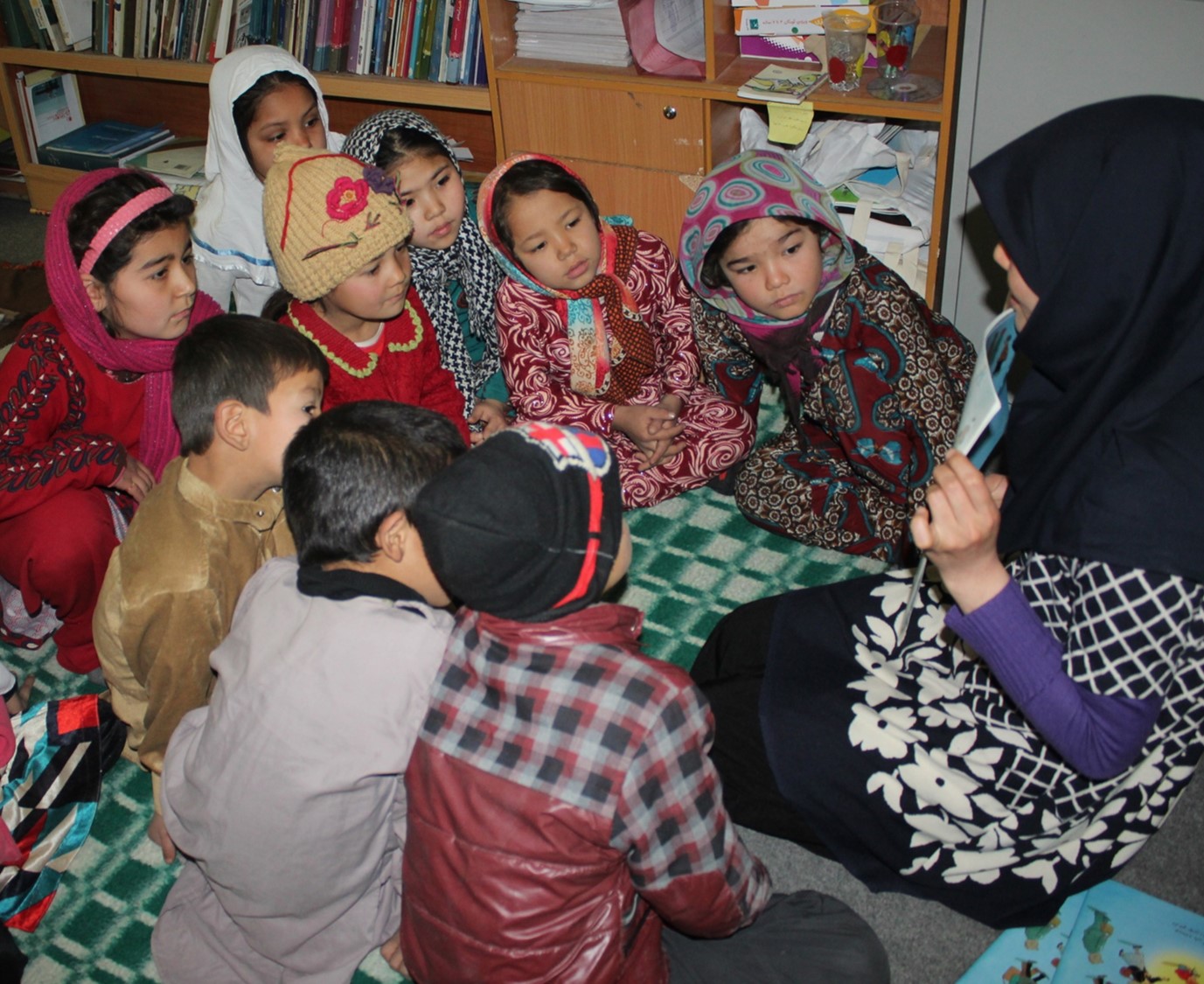 Pictures from “How to Heal a Broken Wing” by Bob Graham has fascinated the children of Mazar-e-Sharif